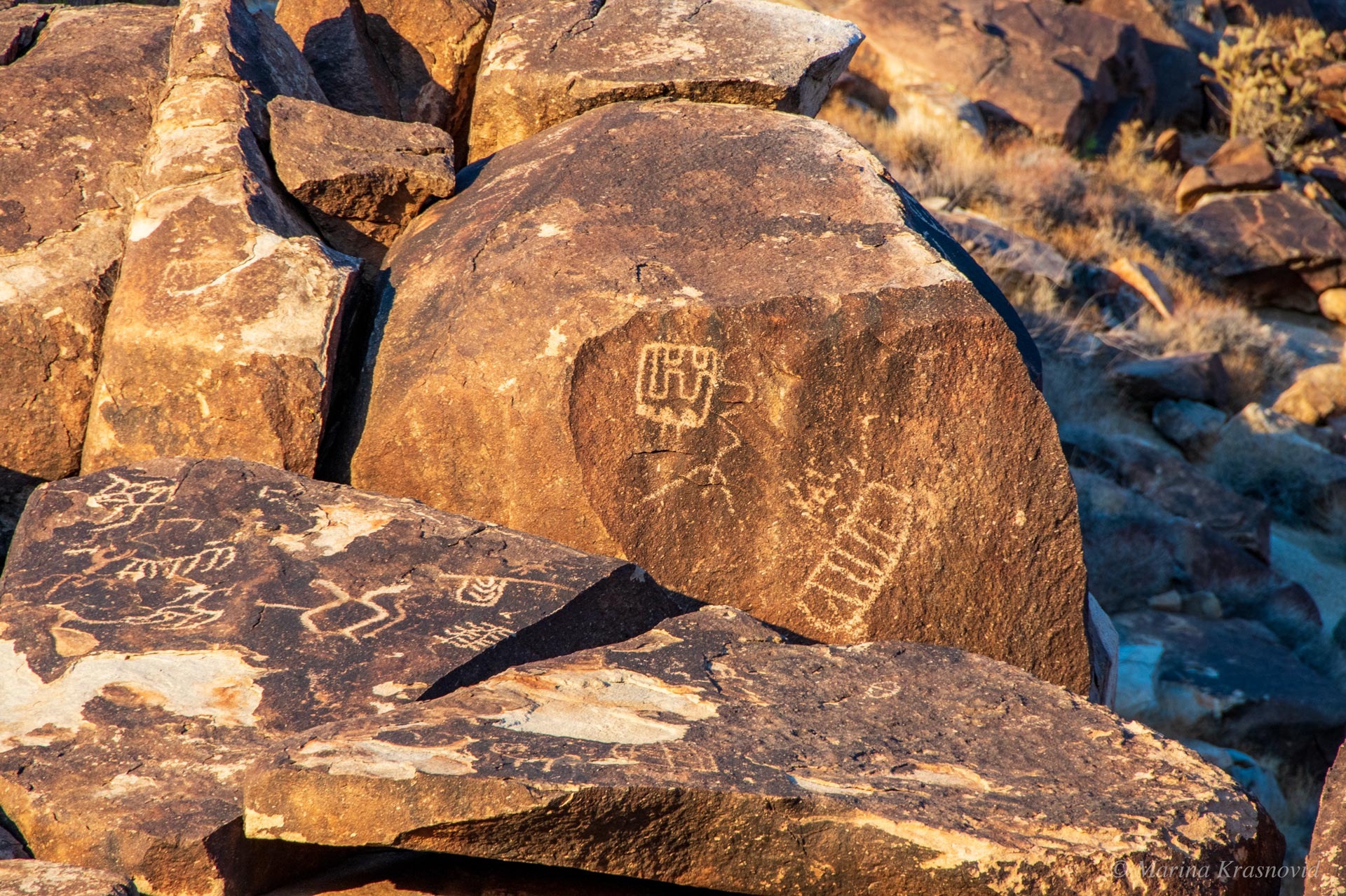 Grapevine Canyon Petroglyphs Petroglyphs with curved lines and geometric figures on three large boulders at Grapevine Canyon, Spirit Mountain near Laughlin NV